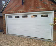 Sectional garage doors